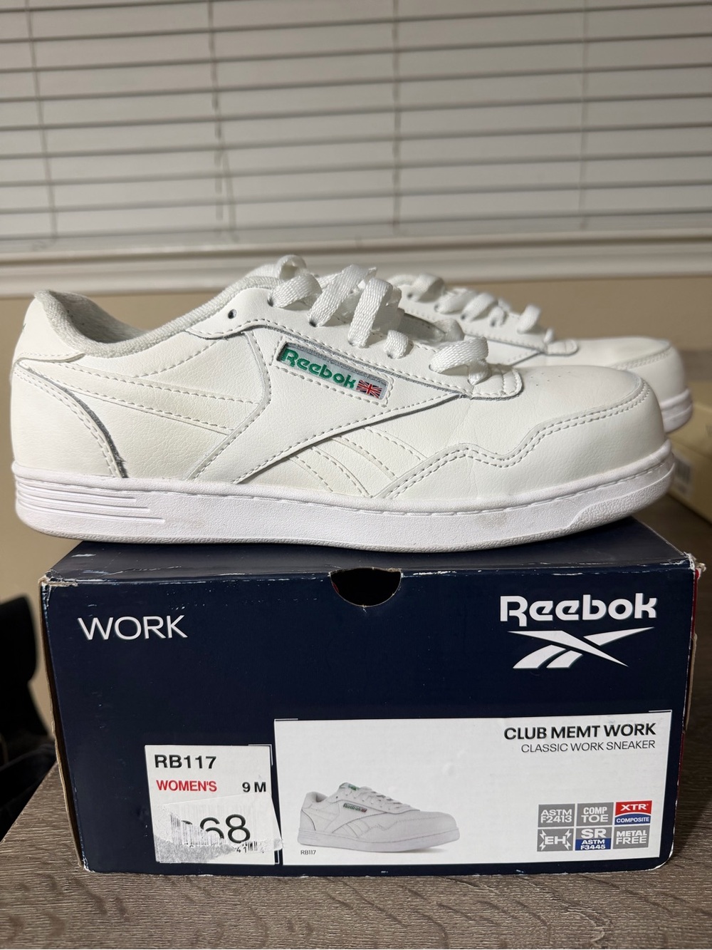 Women’s size 9 Reebok White Low-Top Sneakers with Green Logo